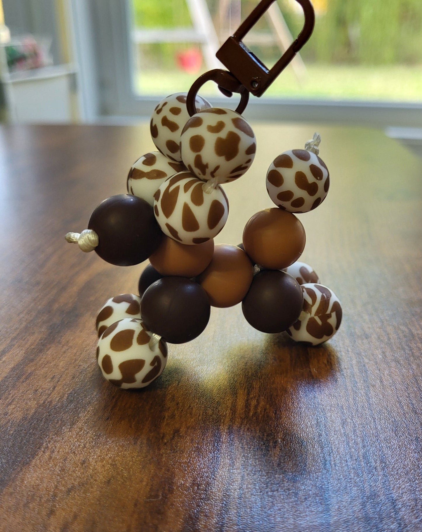 Brown Spotted Beaded Balloon Dog Clip